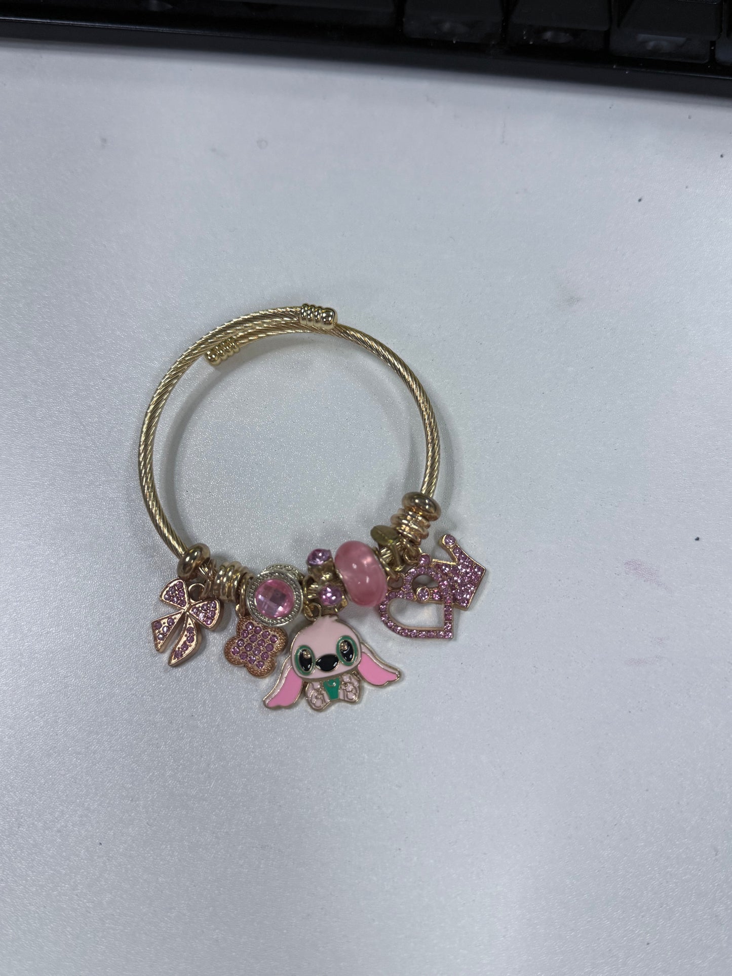 Disney Stitch Angel Charm Bracelet β Pink Crystal Beaded Bracelet with Cute Character Dangle Charms, Silver & Gold-Tone, 5 Unique Styles