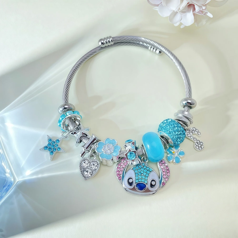 Stitch Charm Bracelet - A Splash of Cool Blue and Silver & Gold Plated