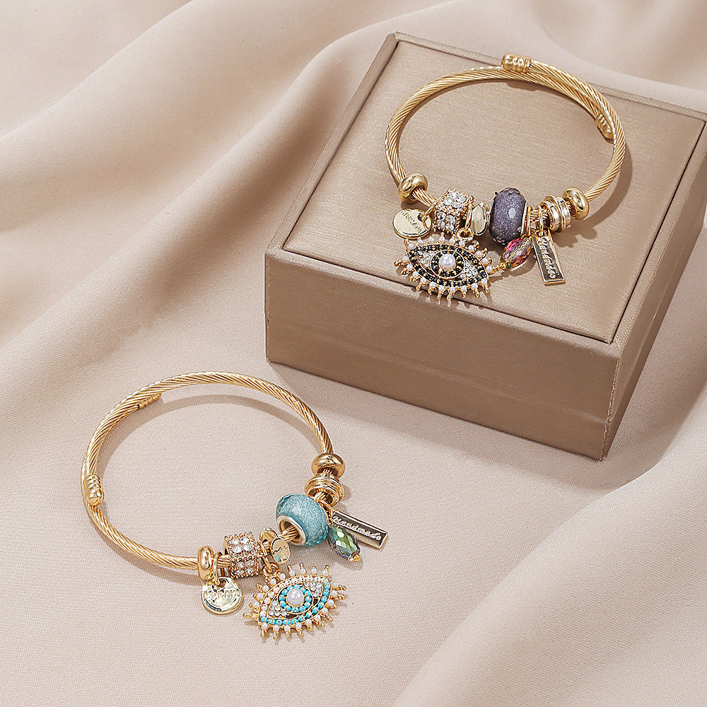 Evil Eye - Themed Charm Bracelet: A Symbol of Protection and Style