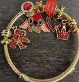 Disney Stitch Angel Charm Bracelet – Pink Crystal Beaded Bracelet with Cute Character Dangle Charms, Silver & Gold-Tone, 5 Unique Styles