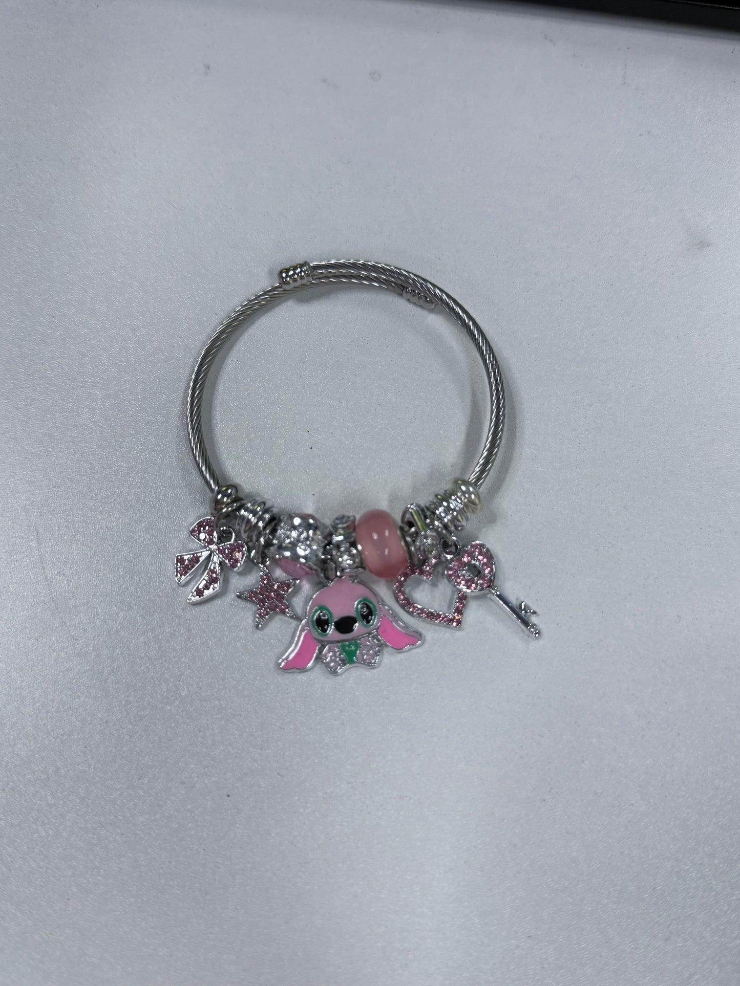 Disney Stitch Angel Charm Bracelet – Pink Crystal Beaded Bracelet with Cute Character Dangle Charms, Silver & Gold-Tone, 5 Unique Styles