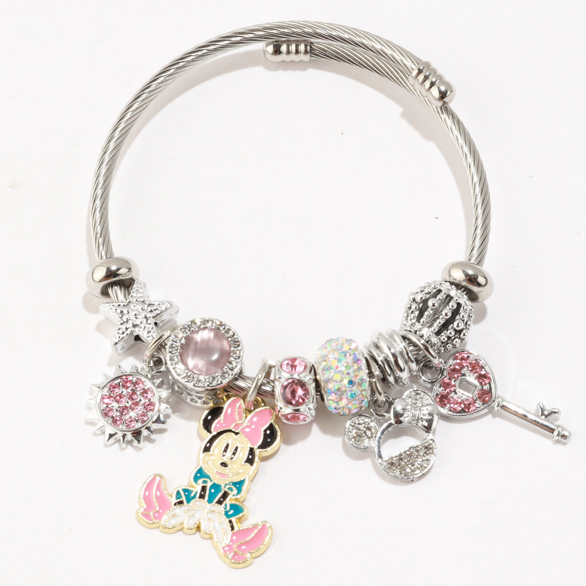 标题 Minnie Mouse Themed Gold - Plated and Silver - Plated Charm Bracelet: A Dash of Disney Elegance