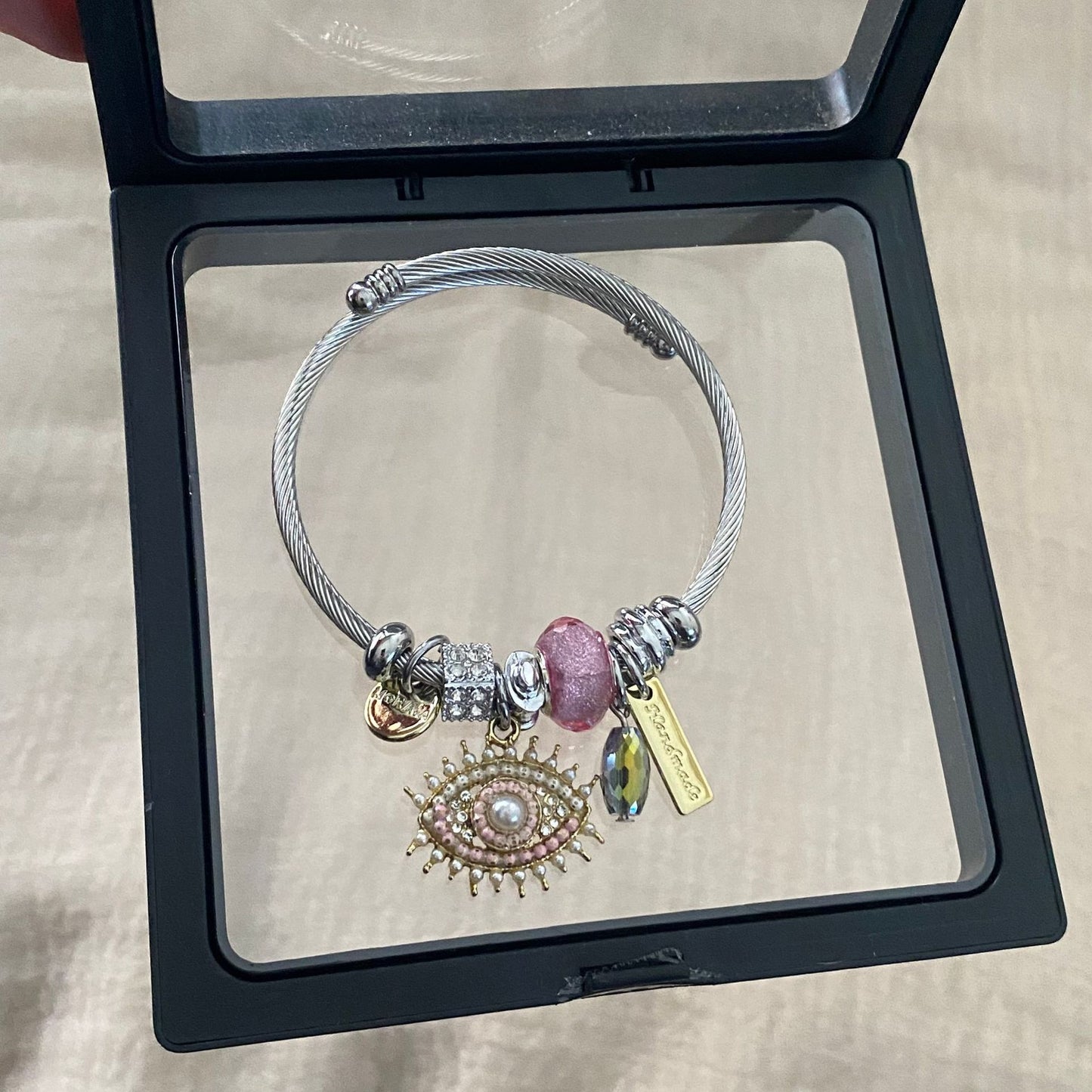 Evil Eye - Themed Charm Bracelet: A Symbol of Protection and Style