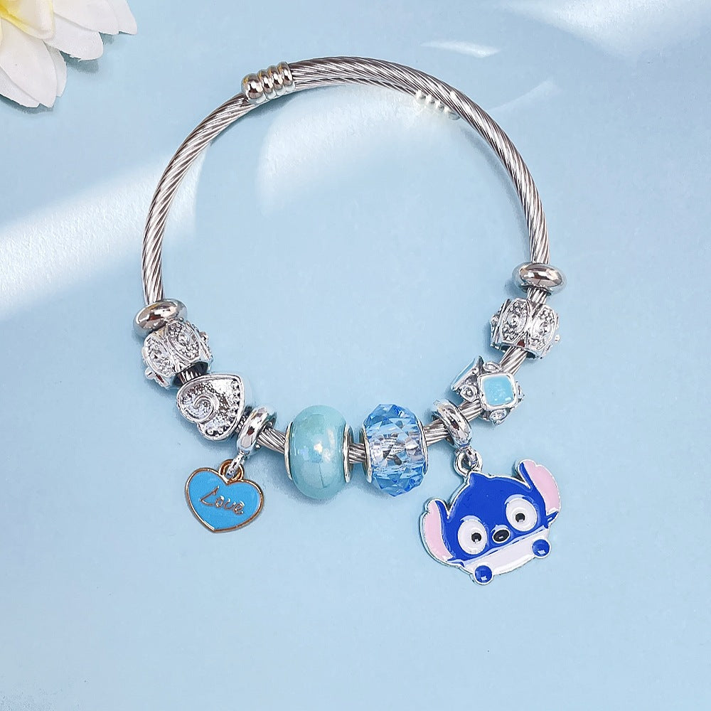 Stitch Charm Bracelet - A Splash of Cool Blue and Silver & Gold Plated