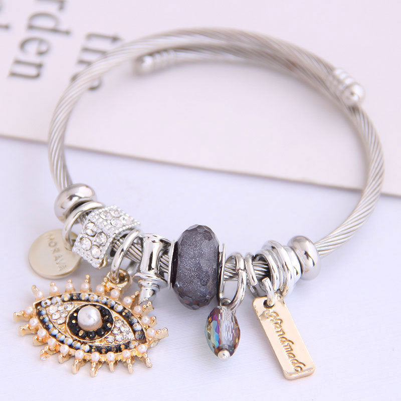 Evil Eye - Themed Charm Bracelet: A Symbol of Protection and Style