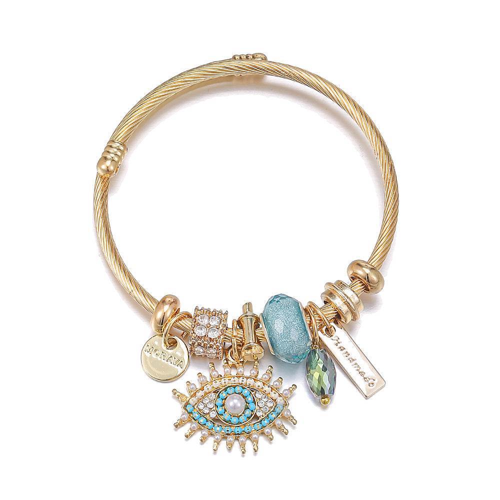 Evil Eye - Themed Charm Bracelet: A Symbol of Protection and Style