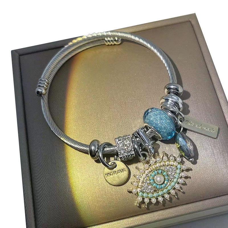 Evil Eye - Themed Charm Bracelet: A Symbol of Protection and Style