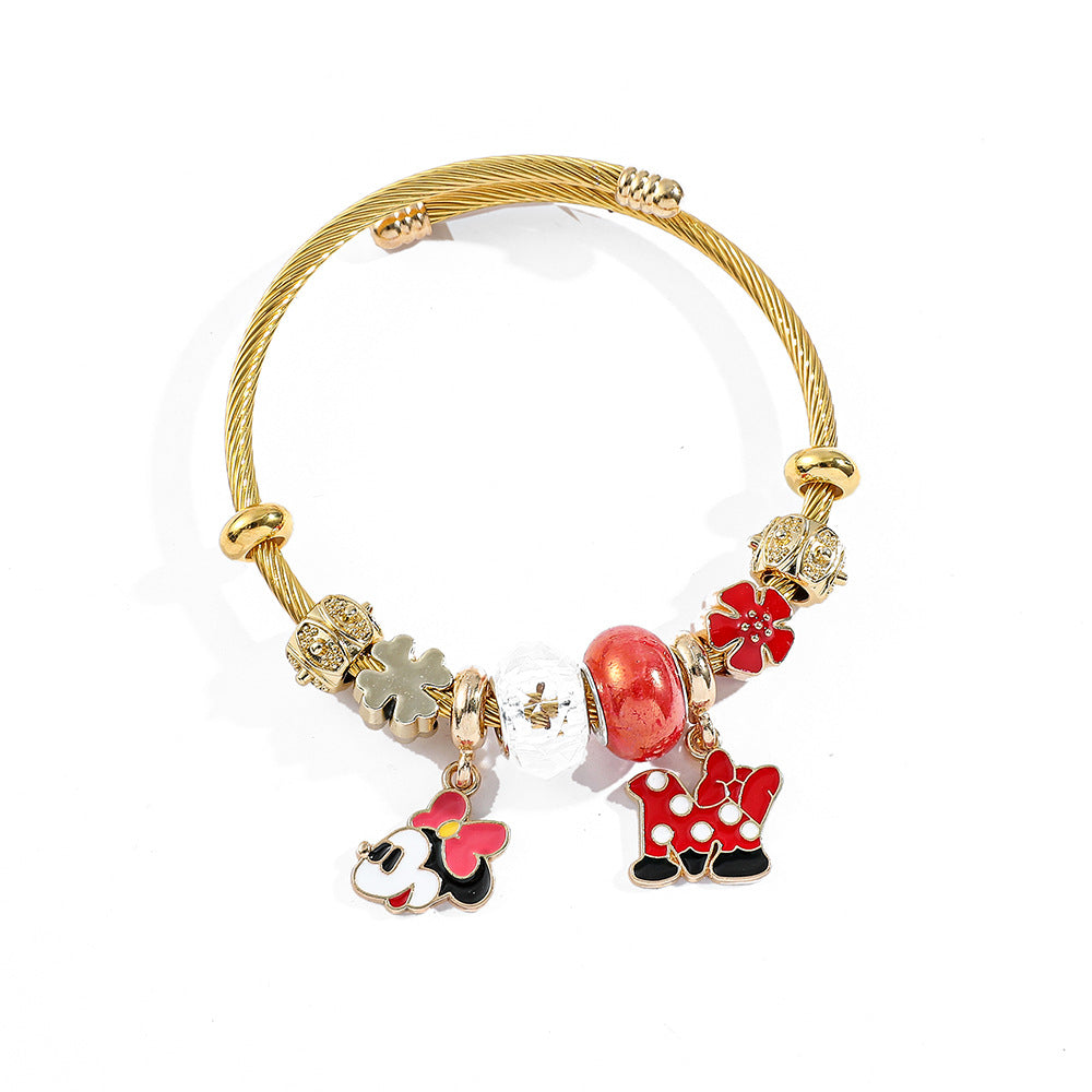 标题 Minnie Mouse Themed Gold - Plated and Silver - Plated Charm Bracelet: A Dash of Disney Elegance