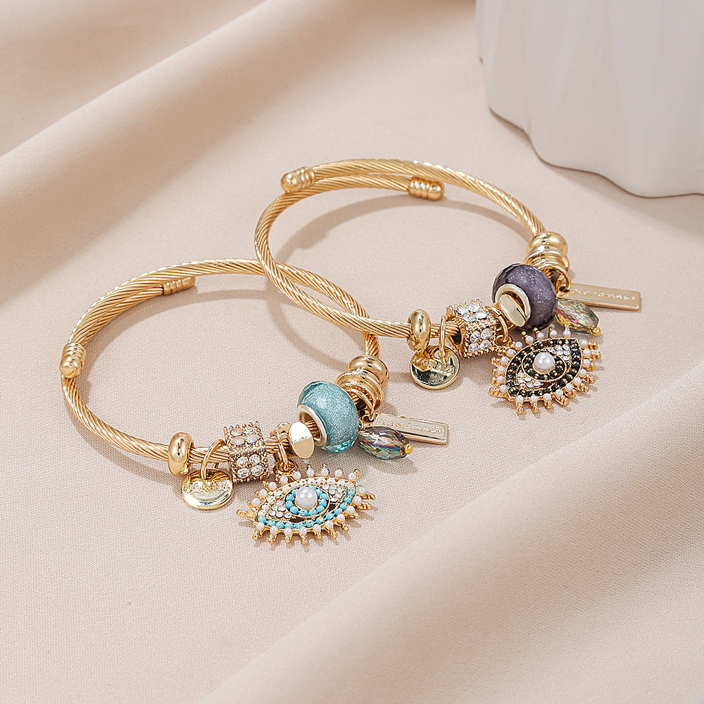 Evil Eye - Themed Charm Bracelet: A Symbol of Protection and Style